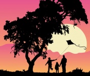Kite Flying Family Sunset