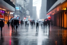 People Walking In The Rain