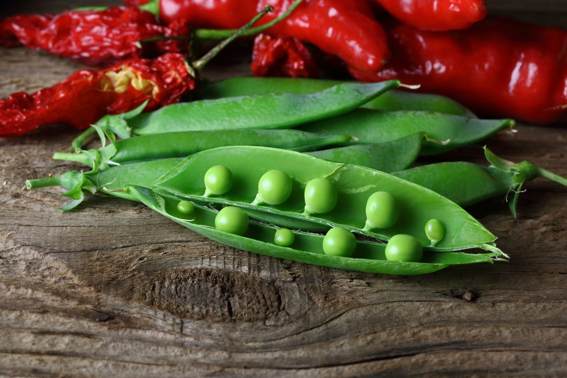 Green Peas In Pod With Red Chilis