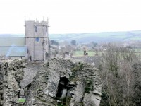 Castle Ruins And Church Clock