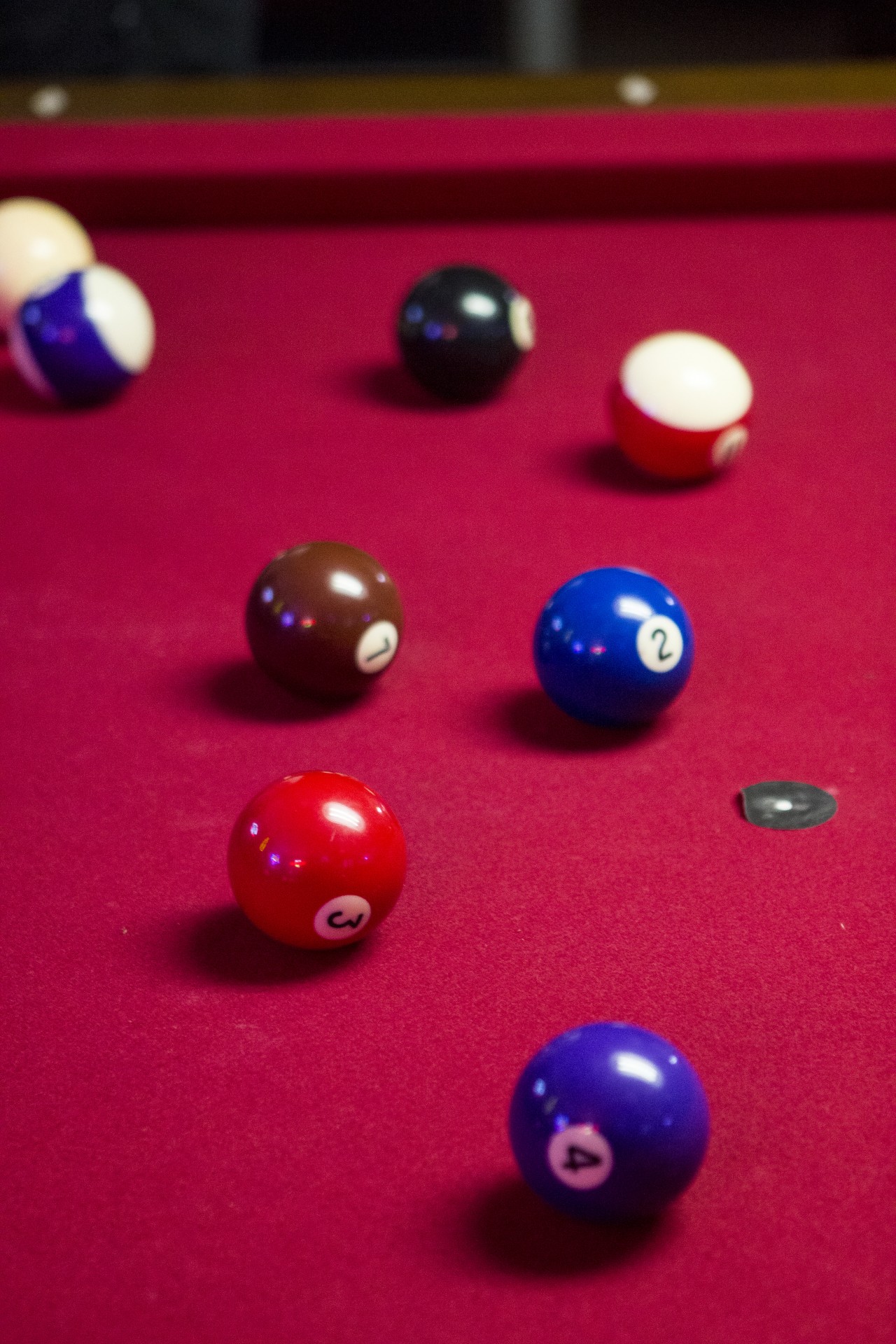 Pool balls on a pool table, balls broken