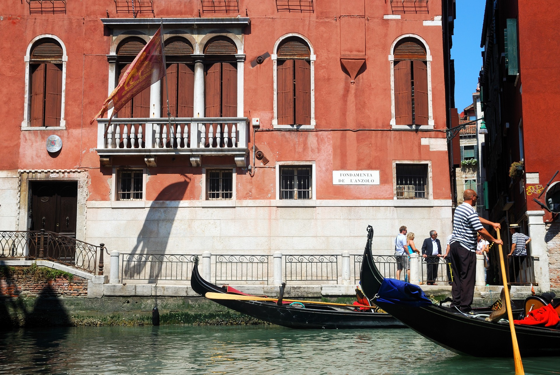 Gondolas and gondoliers in Venice, Italy
