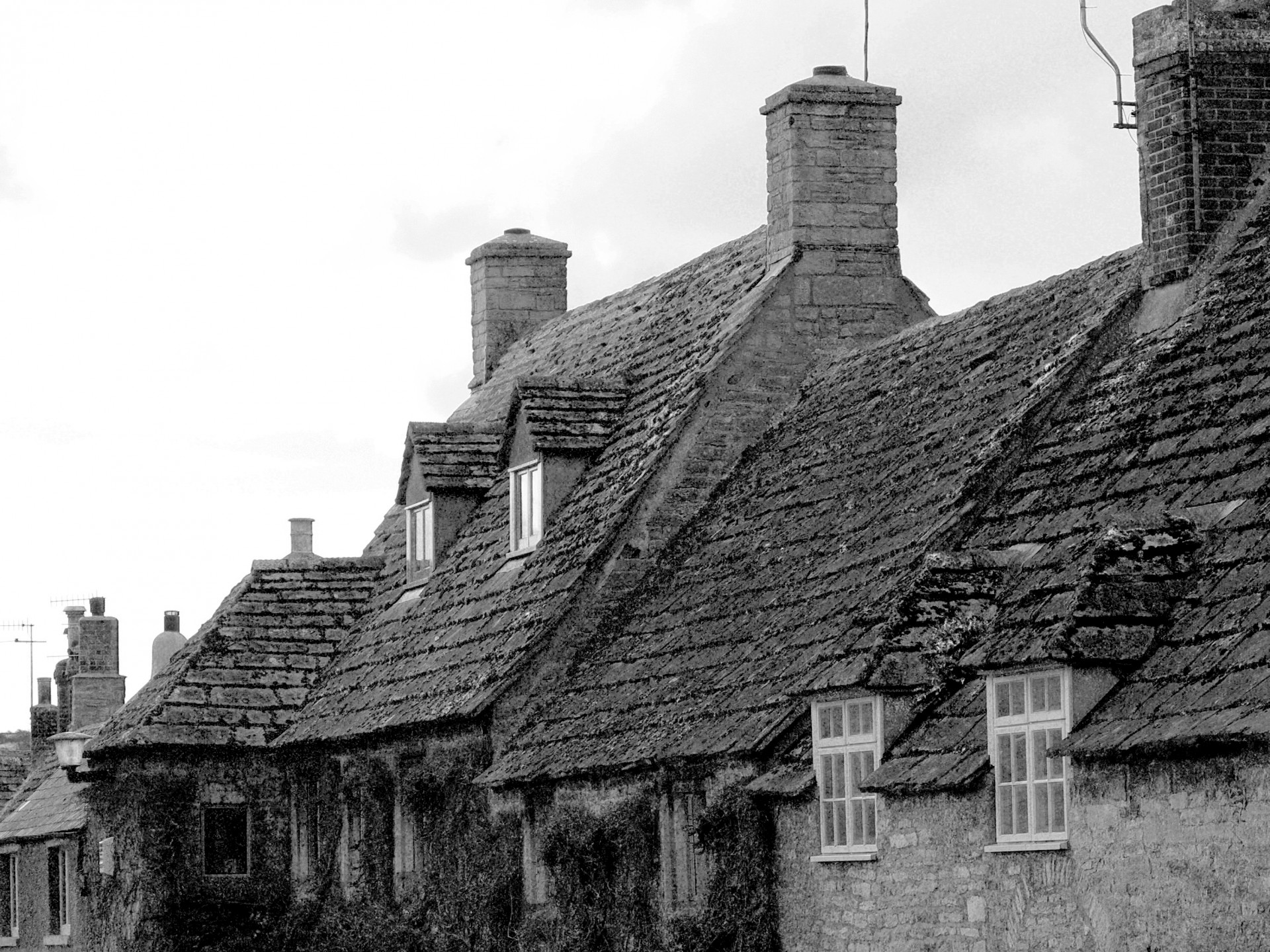 Roofs of old stone houses in village of Corfe