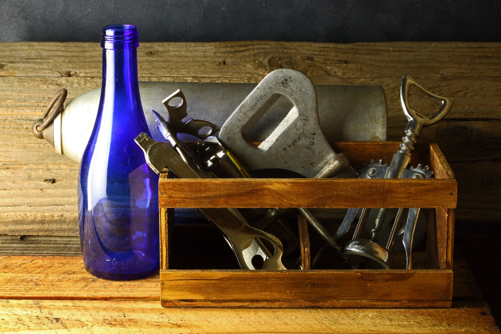 Bottle Openers In A Small Crate