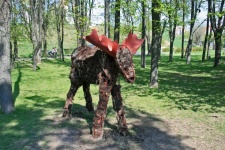 Depiction Of A Moose In A Park