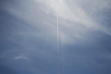 Airplane And Contrails