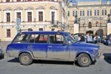 Dust Covered Lada On A Street