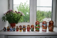 A Row Of Matryoshkas In A Window