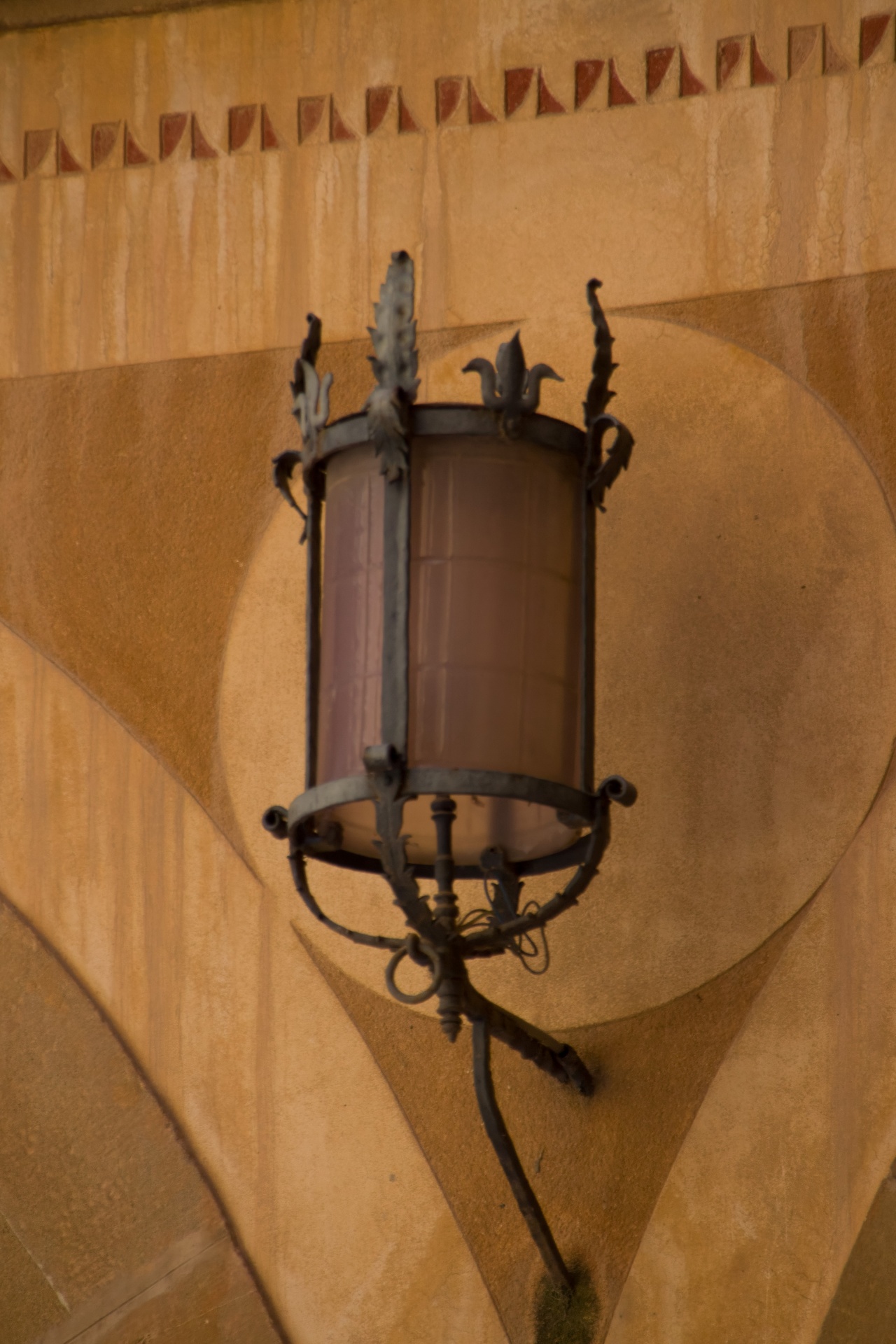 A fancy cast-iron street lantern.