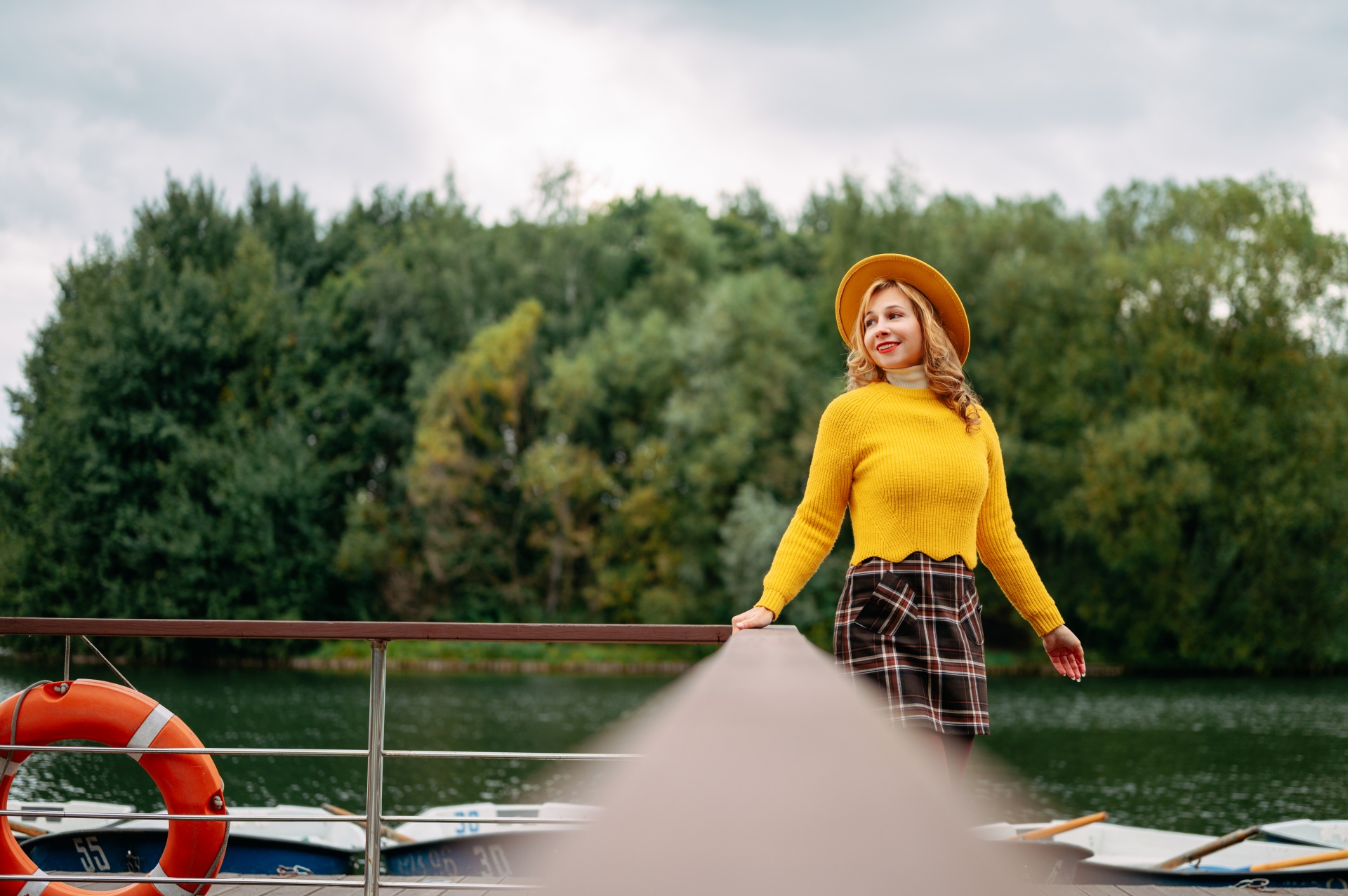 boat station, pier, autumn, rental, boats, woman, entertainment, recreation, posing, model, blonde, yellow, sweater, bright, autumn clothes, fashion, style, lake, river, water, joy, emotions, walk,