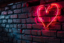Neon Heart On Brick Wall