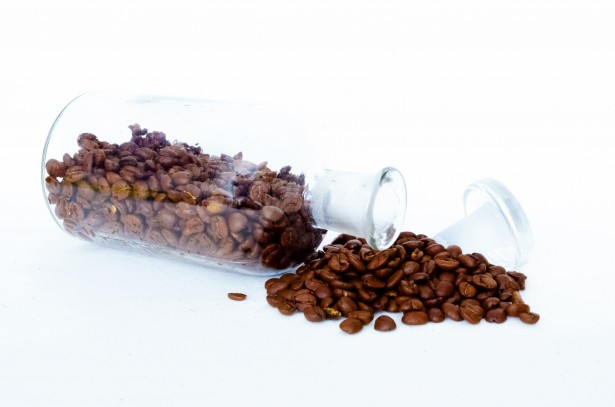 Coffee Beans In A Glass Canister Stock Photo - Download Image Now