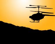 Helicopter Silhouette At Sunset