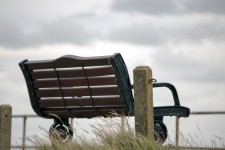 Wooden Bench In Clouds