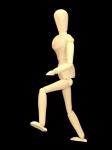 Wooden Figure Walking Uphill