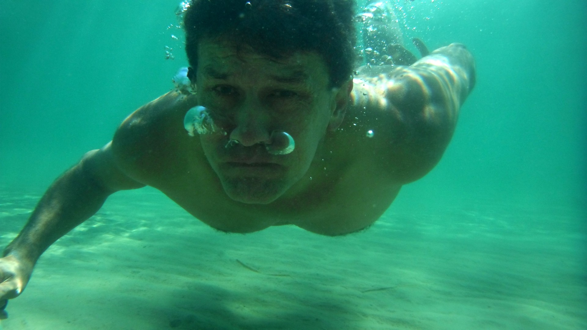 Man Underwater In The Sea