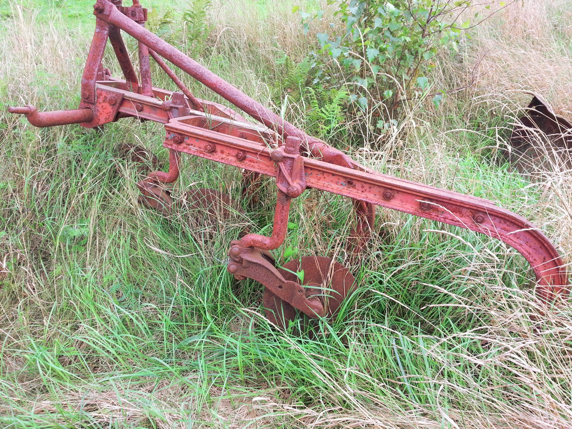 View of old rusty farm machinery