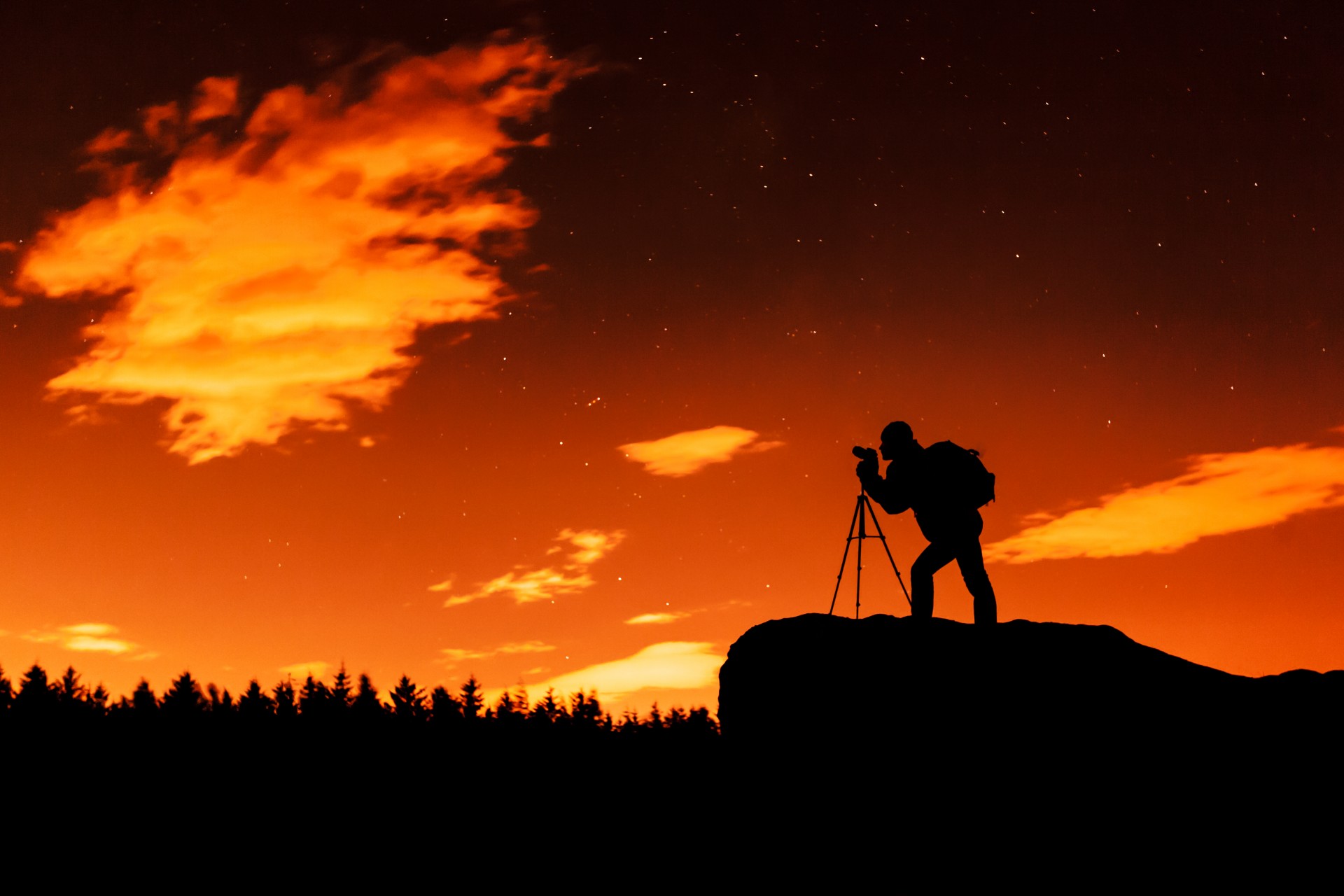 Photographer Silhouette At Night