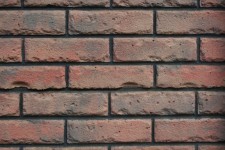 Brick Wall In Red-brown Hues