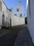 Old Houses And Cobbled Street