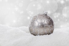Silver Christmas Ball In Snow