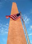 Washington Monument And Flag