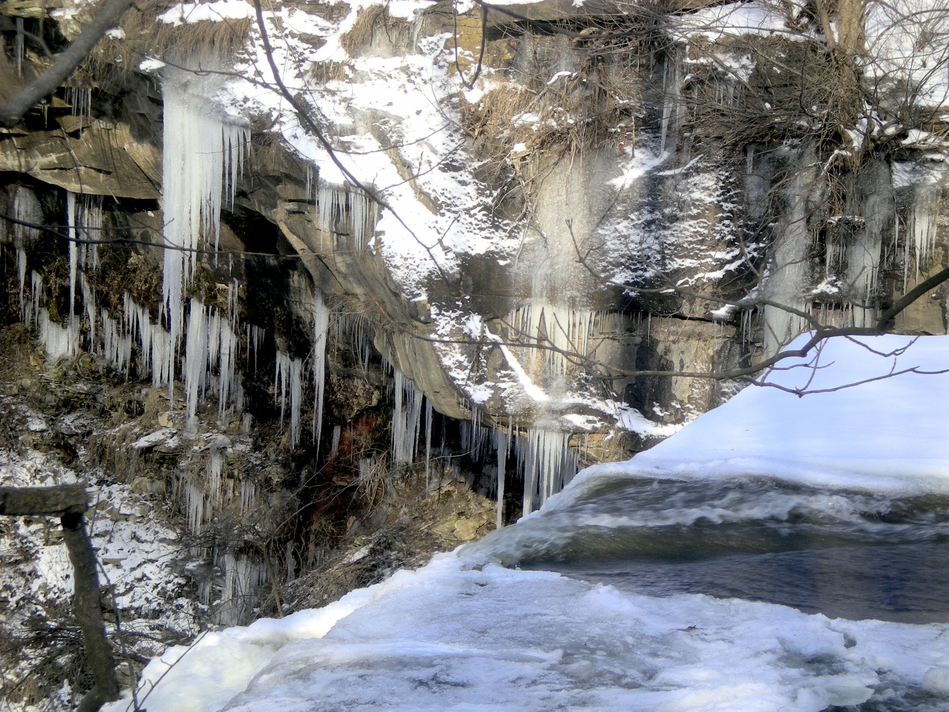 Frozen River And Icicles