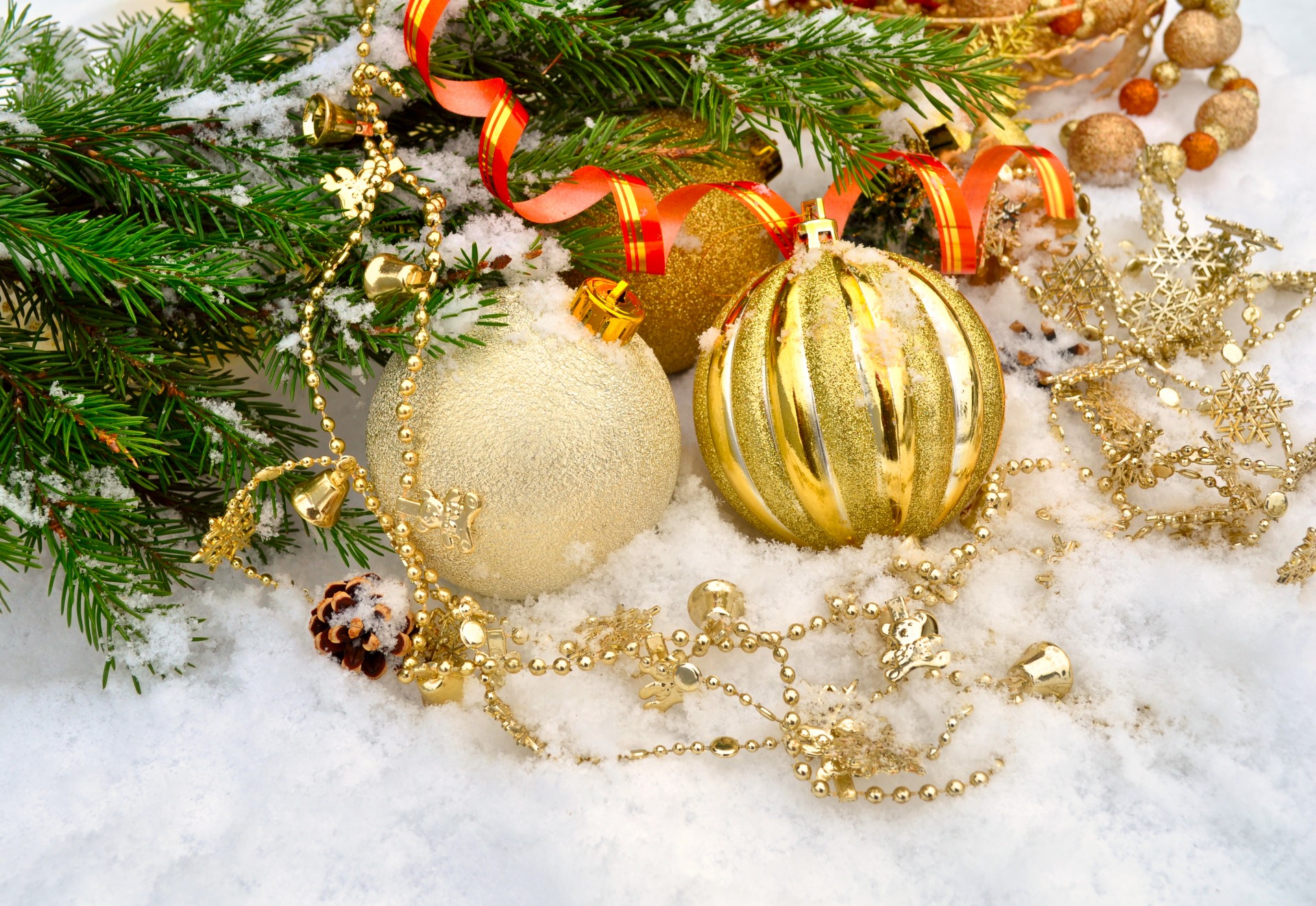 Christmas background with gold balls and Christmas tree branches