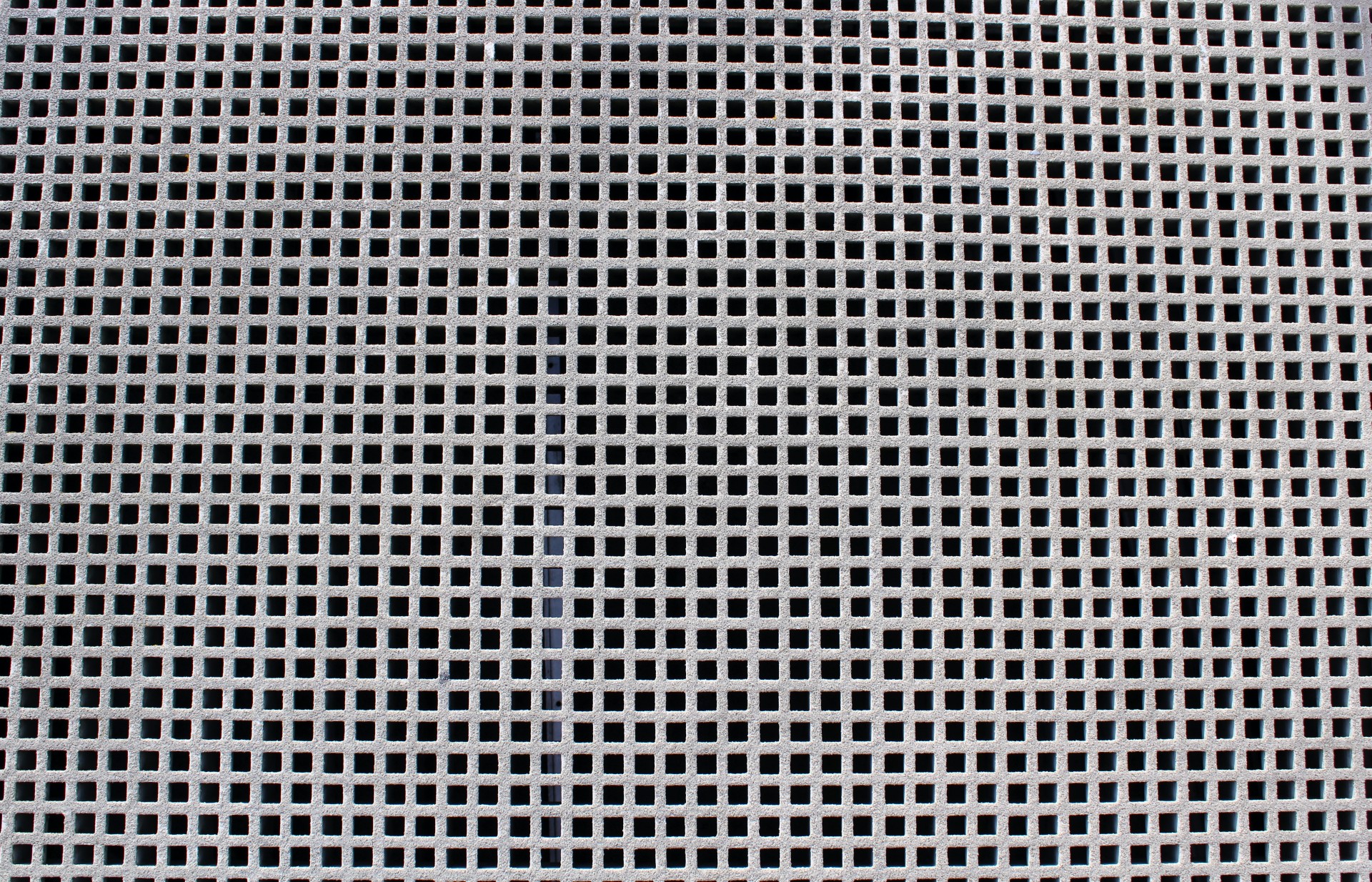 A grate made of geometric squares for use as a background.