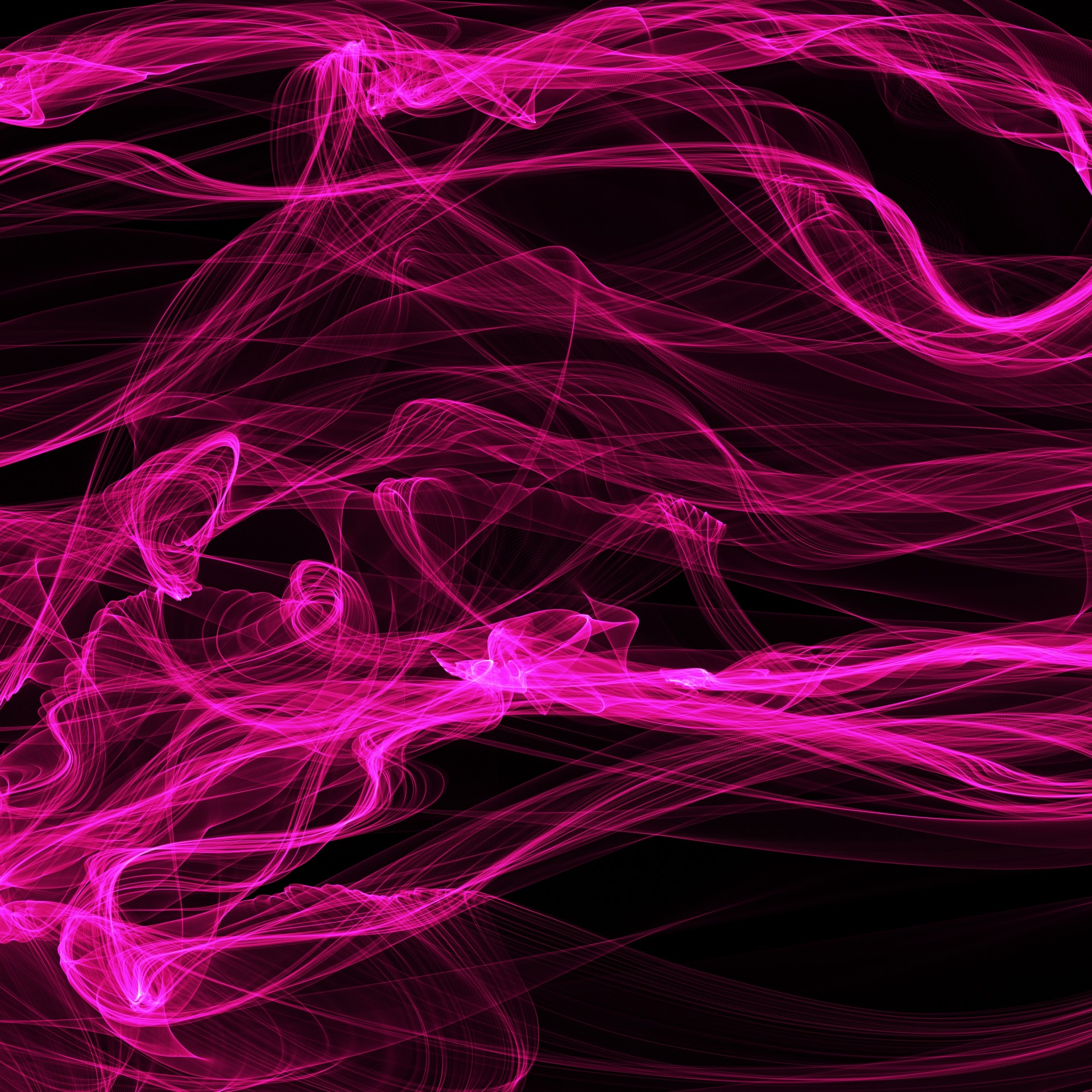Abstract pink smoke on a black background.