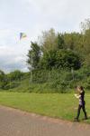 Child Flying A Kite