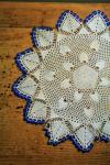 Doily On Wood Surface