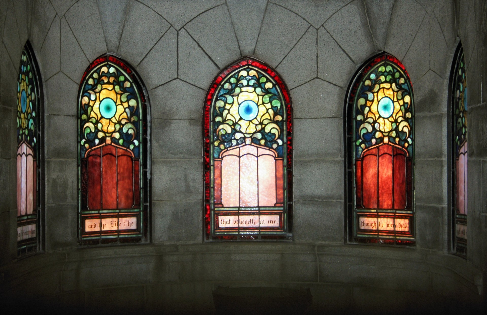 Stained glass window with beautiful details close up with gorgeous color.